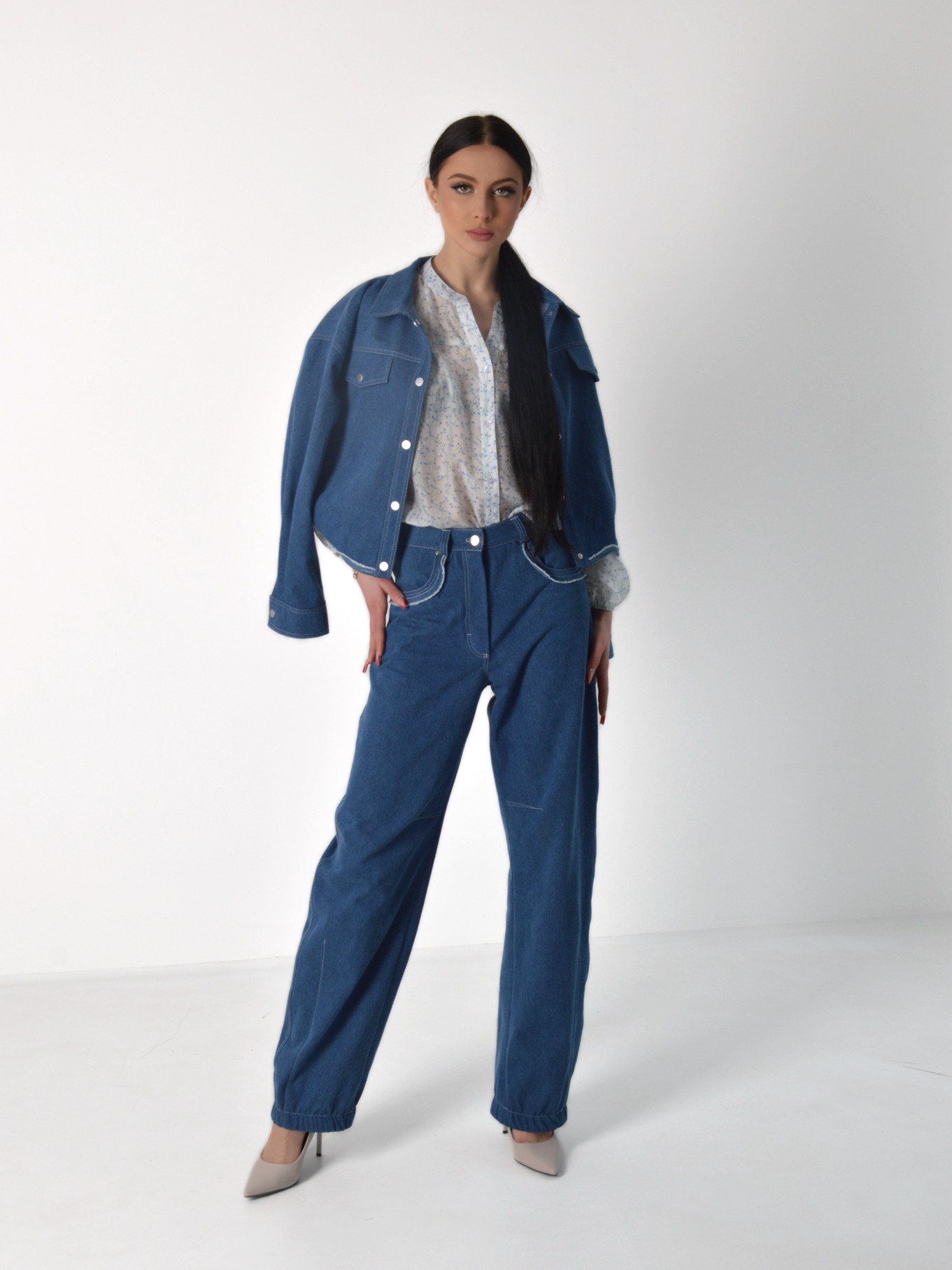 Джинси темно-блакитні з декорованими кишенями