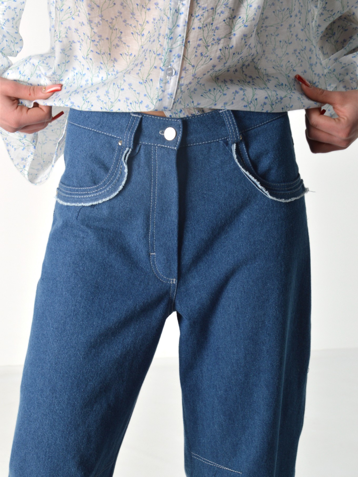 Джинси темно-блакитні з декорованими кишенями